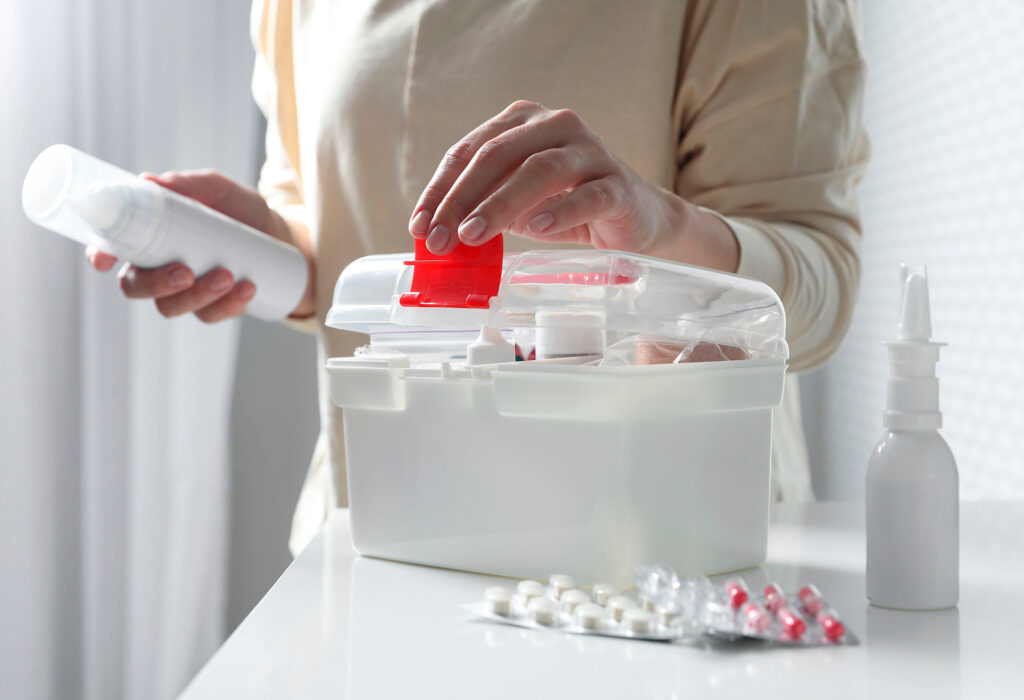 Post-operative care kit with wound supplies, arnica gel, and medications organized for at-home recovery support