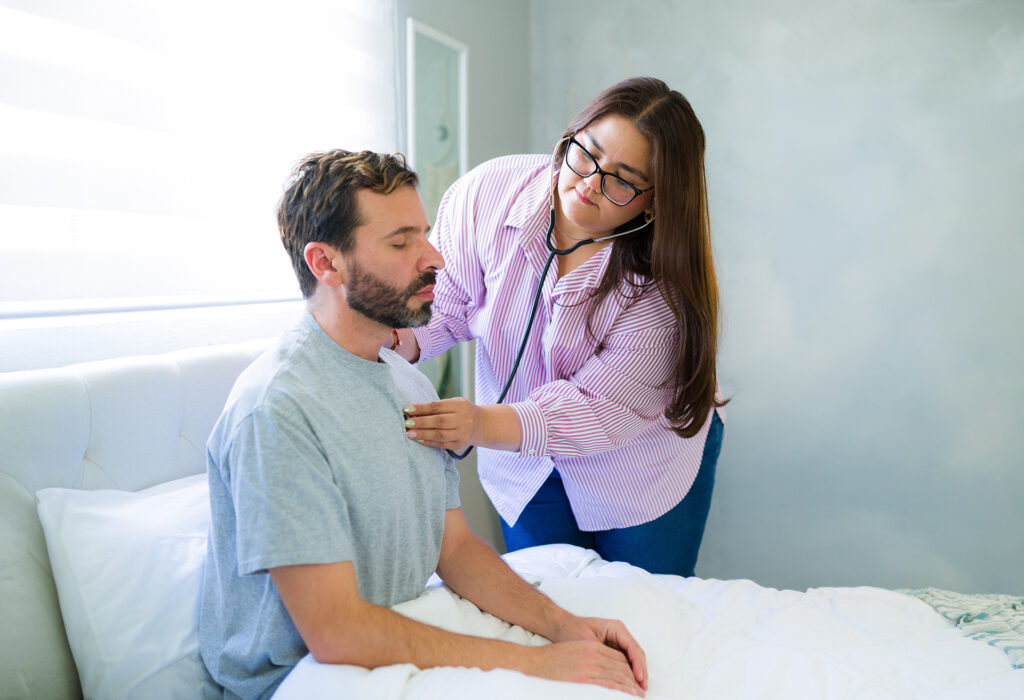 Healthcare provider checking patient’s condition during post-operative visit, ensuring recovery progress and ongoing clinical support